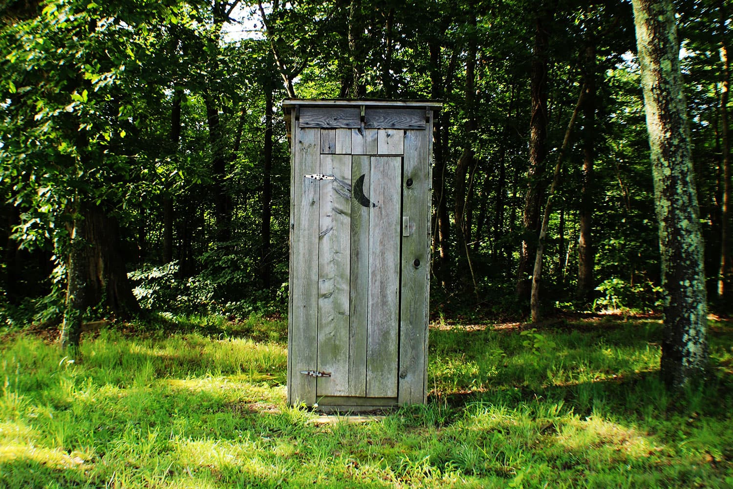 Types of Toilets Around the World - wooden outhouse