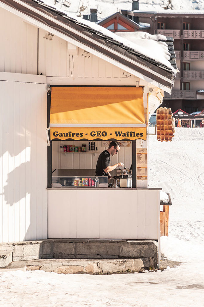 Where to Exchange Currency - man selling waffles
