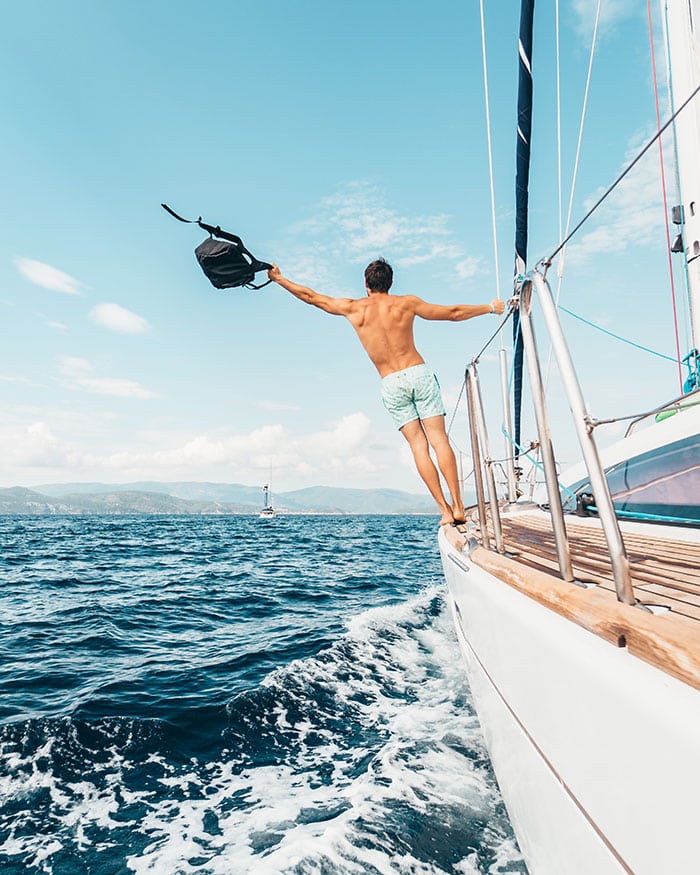 Is Travel Insurance Worth It - man on boat
