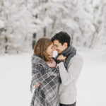 Christmas Captions for Instagram - Couple in Snowy Forest