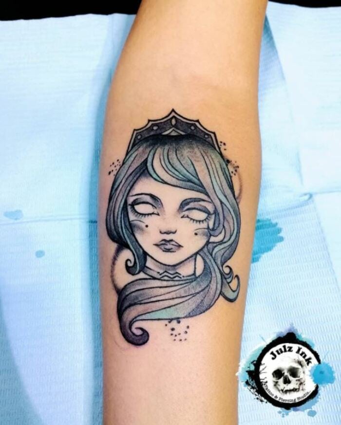 Aquarius Tattoos - black and blue water bearer face tattoo