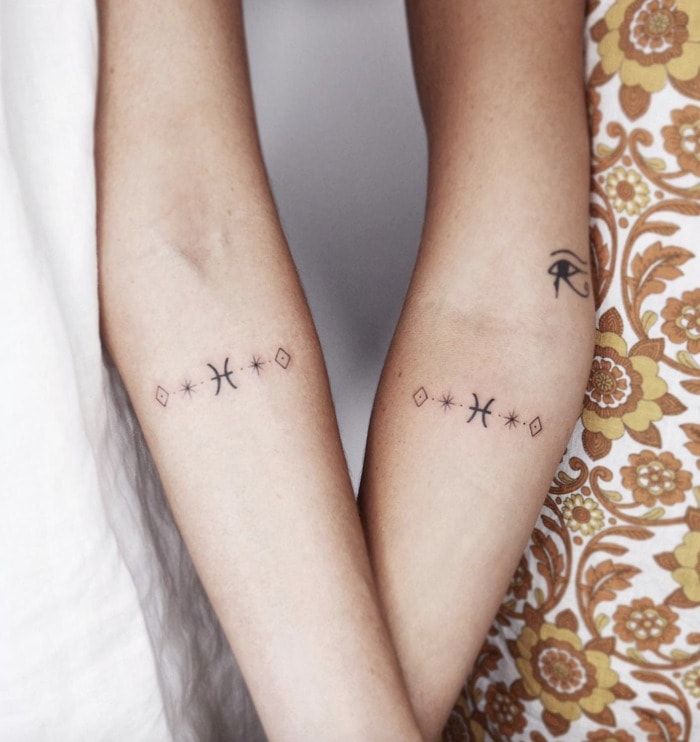Pisces Tattoos - matching pisces symbol tattoos