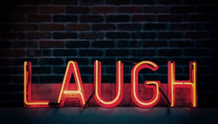 Knock Knock Jokes - laugh sign in neon letters