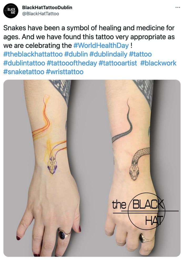 Wrist Tattoos - wraparound snake tat