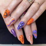 Halloween Nail Designs - purple and orange designs