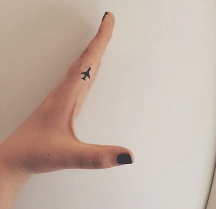 Small Tattoos - tiny airplane