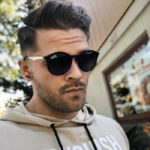 Nose Piercing Men - guy wearing sunglasses with nose stud