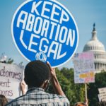History of Abortion Timeline - Keep Abortion legal protest sign