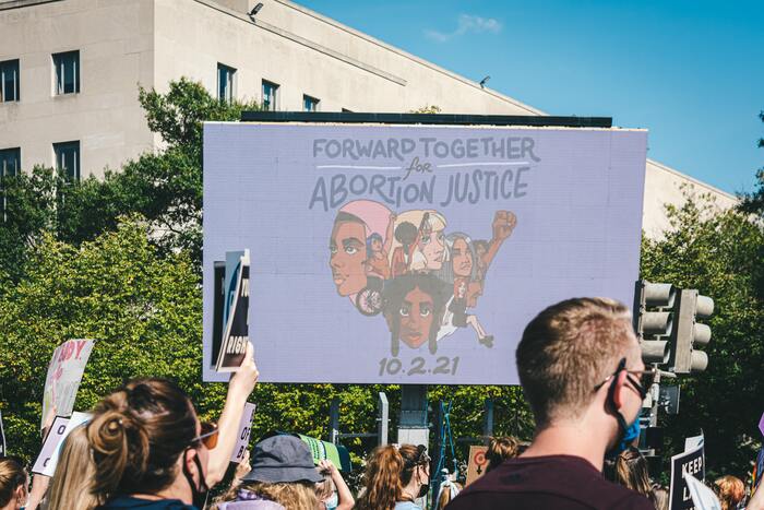 History of Abortion Timeline - abortion justice protest sign