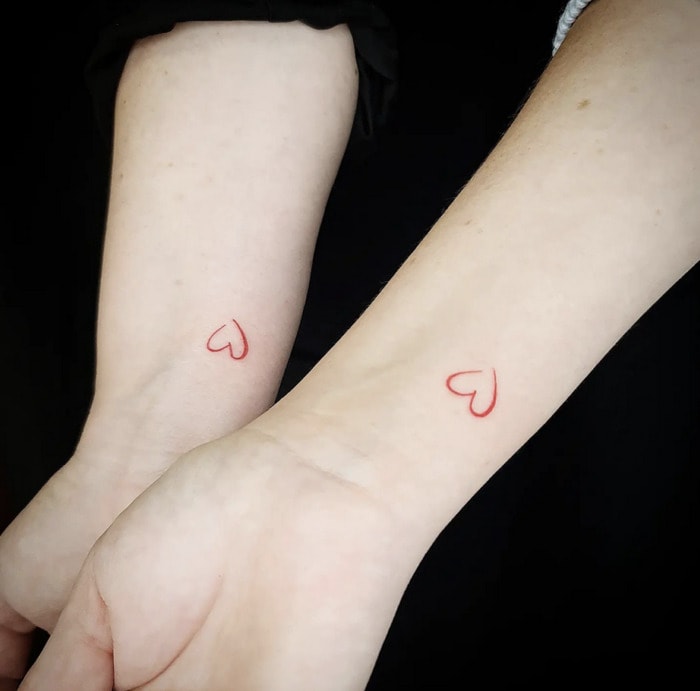 Small Wrist Tattoos - matching hearts