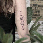 Zodiac Tattoos - planet arm tattoos