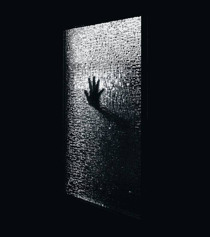 scary stories - hand on window