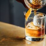 Old Fashioned - pouring liquor