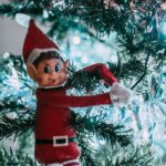 Christmas Puns Jokes - Elf Hanging on a Christmas Tree