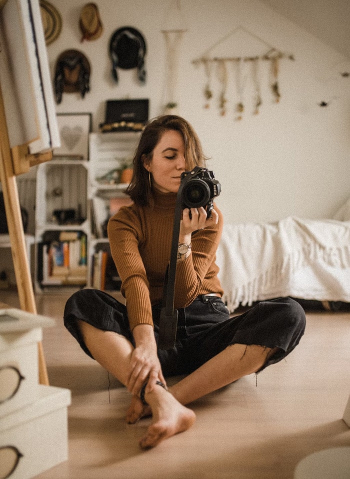 Physically Active Self Care Ideas - woman with camera