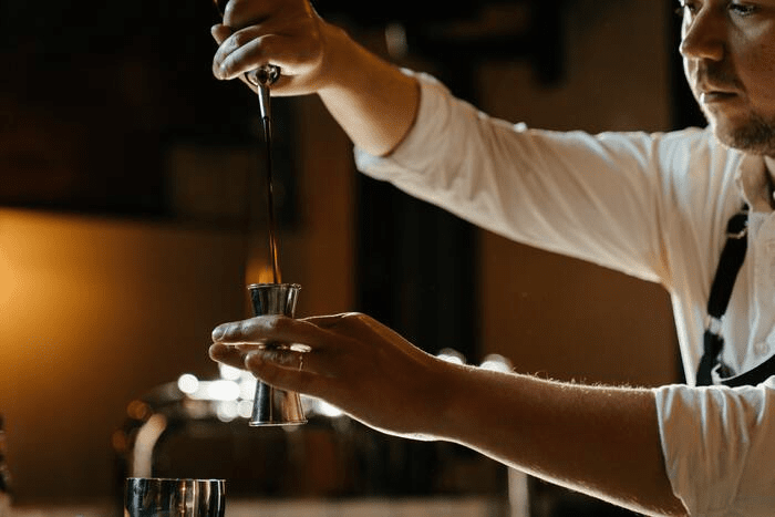 How many ounces in a shot- bartender pouring a shot