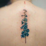 Flower tattoos- Larkspur Spine Tattoo