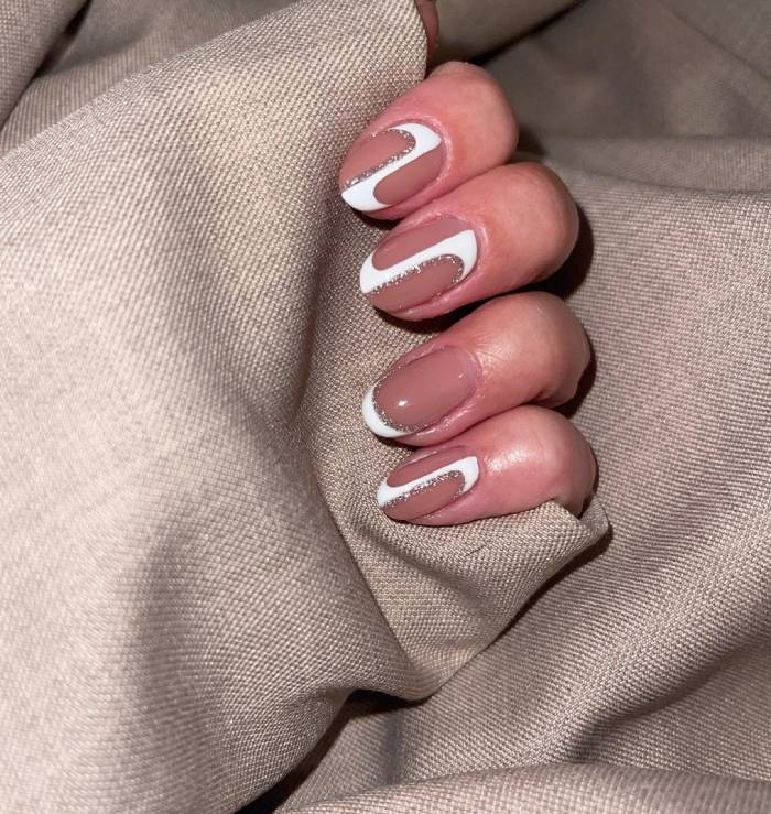 May Nail Design Ideas - white swirl with glitter