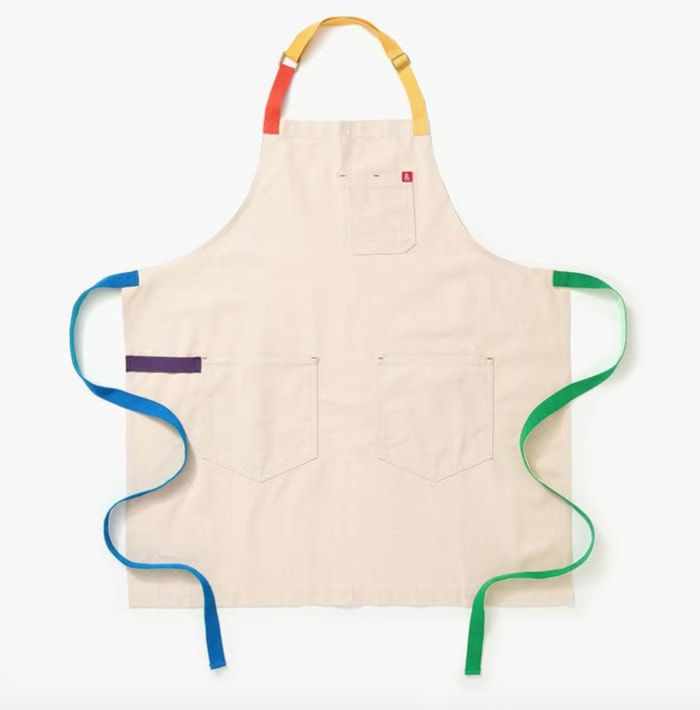 pride products that give back - rainbow-edged apron