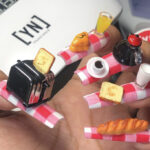 august nail design ideas - lunch charms