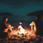 best LGBTQ dating apps - two people on a date at a campfire