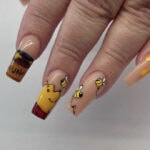 disney nail designs - winnie the pooh nails