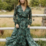best fall wedding guest dresses 2023 - flowy green and black floral maxi dress