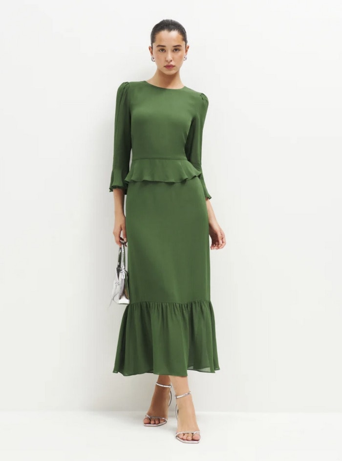 best fall wedding guest dresses 2023 - fitted green peplum dress