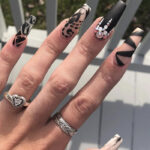 November nail designs - matte black Scorpio Nails
