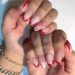 December Nail Designs 2023 - Add a candy cane statement nail