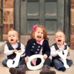 Funny Christmas Photos - crying kids holding joy letters
