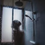 Winter Skincare Tips - woman taking a shower